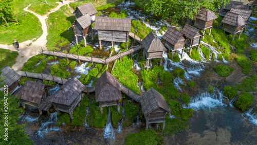 Aerial view of traditional wooden watermills on Pliva lakes near Jajce town