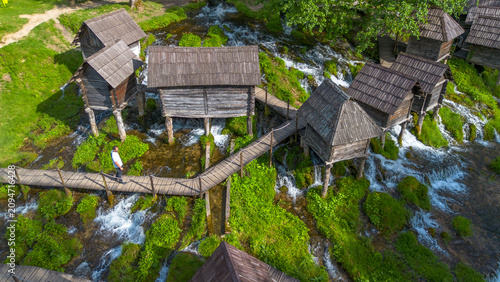 Quadro su tela Aerial view of traditional wooden watermills on Pliva lakes near Jajce town
