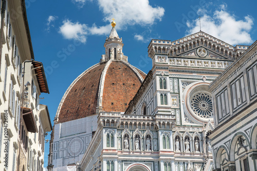 The landmark cathedral of santa maria del fiore on a blue sky sunny day in Florence italy