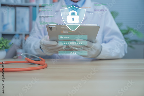 A medical professional is using a tablet displaying a digital security padlock icon, symbolizing patient data protection, cybersecurity in healthcare, HIPAA compliance, and secure medical information 