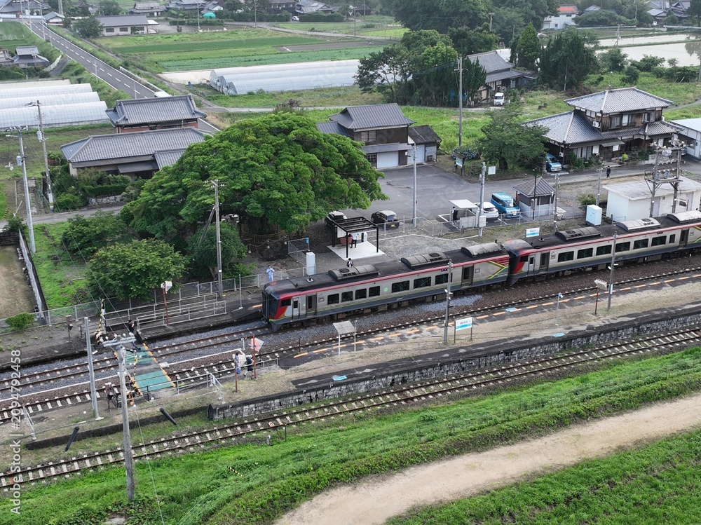 Obraz premium Special Train Passing Sanuki-Saita Station on the Dosan Line, Kagawa, Japan