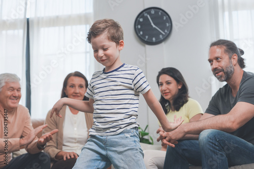 Canvas Print A big multicultural family spend quality family time together in a warm, sunlit lounge, a heartwarming moment of togetherness at home, celebrating home life and family connection