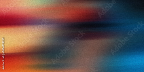 Vibrant abstract background featuring motion blur effect with soft gradients of orange red and deep blue colors creating dynamic flow.
