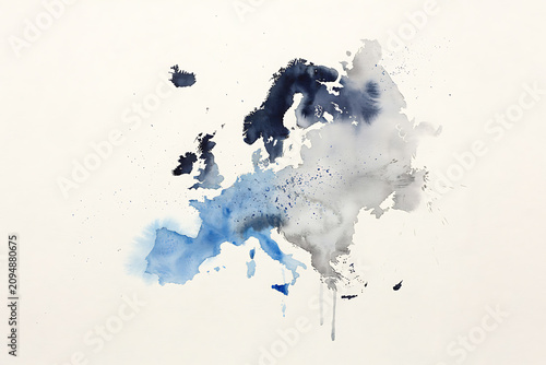 Artistic watercolor map of europe painted in shades of indigo and blue with splatters and drips on a textured white paper background