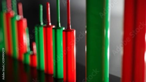 Red and green plastic cylinders arranged in a bar chart style
