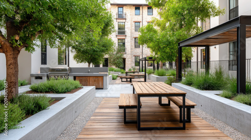 Picnic Tables and Hanging Plants in Inner Courtyard BBQ Area