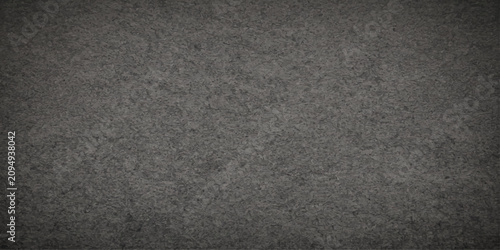 Bild auf Leinwand Close-up, textured surface of dark grey felt material, suggesting warmth, softness, and tactile quality