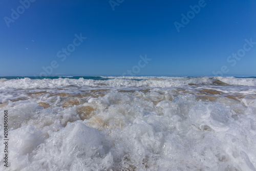 Fotografie POV Wave Splash at Cofete Beach in Jandia Natural Park Fuerteventura