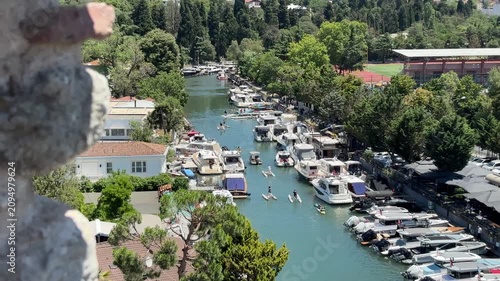 Boats and people canoeing on the Goksu River in Beykoz, Istanbul, Turkey.