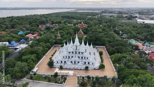 Wat Asokaram. Aerial drone footage of Phra Thutangkha Chedi at Wat Asokaram in Samut Prakan Thailand. Aerial view Thai landmark or travel destination for tourist who seeing Thai architecture culture.