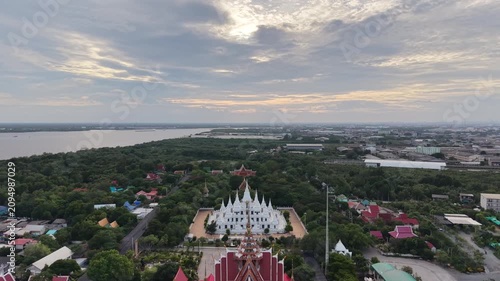 Wat Asokaram. Aerial drone footage of Phra Thutangkha Chedi at Wat Asokaram in Samut Prakan Thailand. Aerial view Thai landmark or travel destination for tourist who seeing Thai architecture culture.