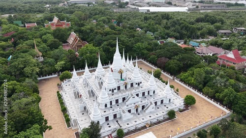 Wat Asokaram. Aerial drone footage of Phra Thutangkha Chedi at Wat Asokaram in Samut Prakan Thailand. Aerial view Thai landmark or travel destination for tourist who seeing Thai architecture culture.