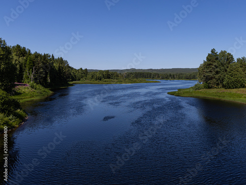 Västerdalälven River Bend in Sweden Under Clear Summer Sky