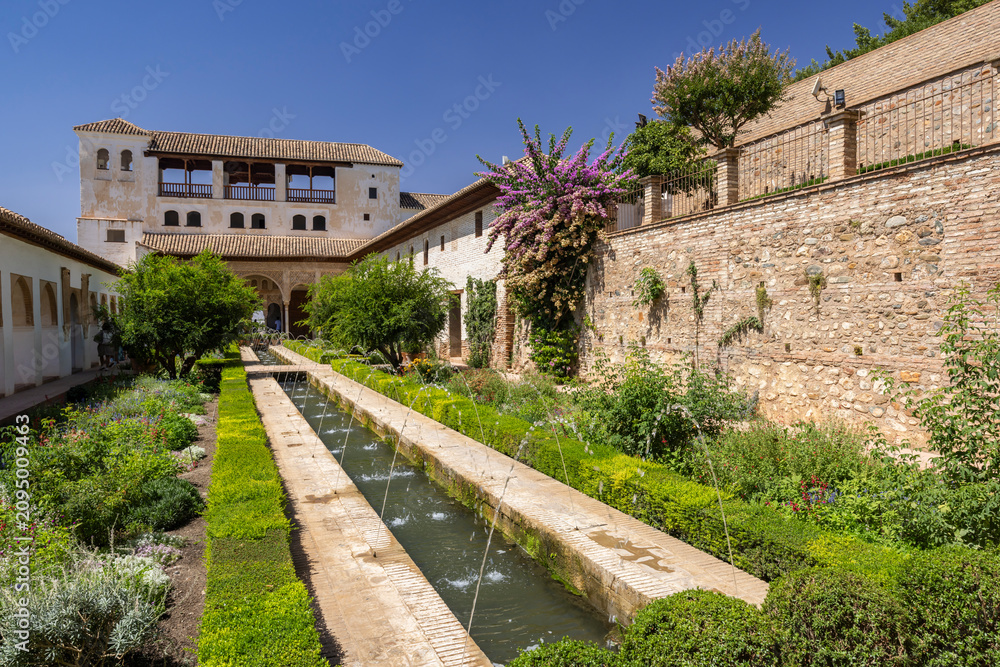 Fototapeta premium Generalife gardens water channel depicting Moorish architecture Granada