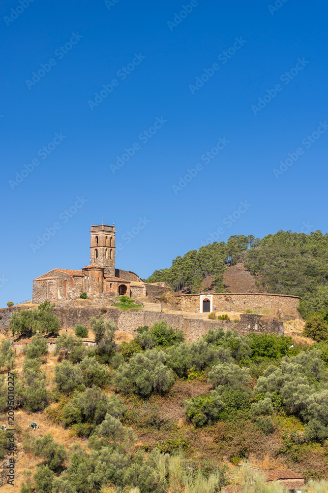 Fototapeta premium Mosque of Almonaster la Real old building under blue sky