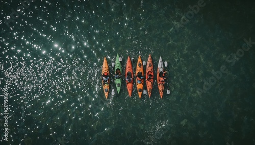 Kayaker Paddles Alone in Open Water During Sunny Day