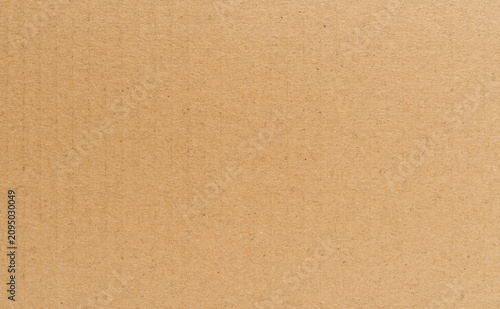 Cardboard texture, light brown kraft paper close up  background