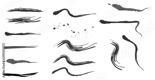 Photos Collection of artistic black ink brush strokes and paint splatters for creative