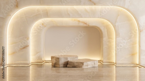 Two stone pedestals placed inside a curved marble arch with lighting