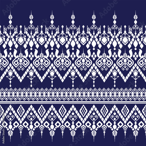 Foto Traditional Thai Geometric Pattern Seamless Background in Indigo Blue and White abstract design for fabric print cloth dress carpet curtains and sarong Thailand