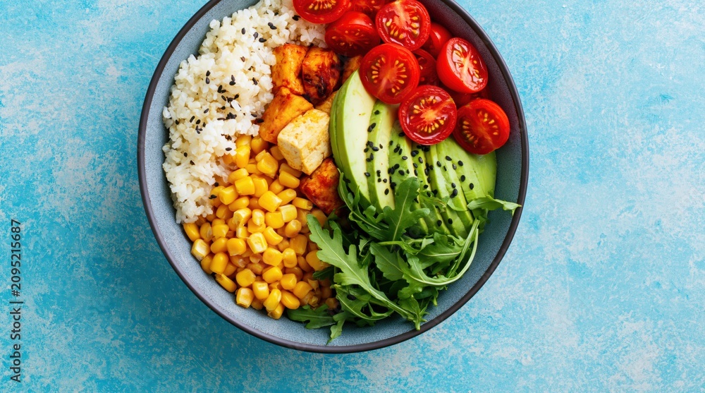 Obraz premium Buddha bowl with fresh healthy vegan food for a nutritious vegetarian lunch dinner