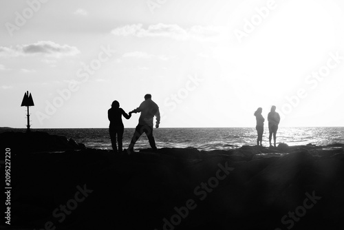 Family on jetty