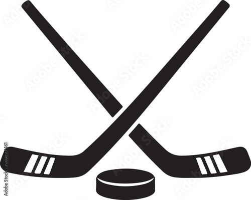 Obraz na płótnie Crossed hockey sticks with a puck silhouette vector
