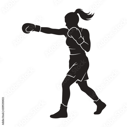 Dynamic silhouette of female boxer in action throwing a powerful punch with boxing gloves and athletic gear