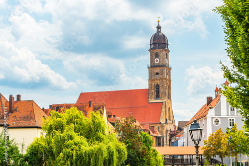Fotografie Historic church tower above old town roofs in Amberg Germany