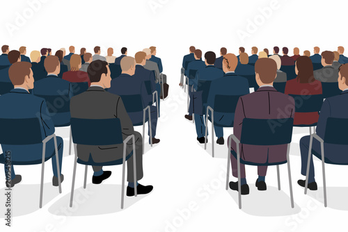 Group of business people sitting in a conference hall, back view