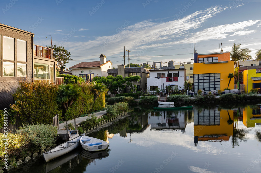 Obraz premium Venice Beach Canal in Los Angeles California Popular Travel Destination with Palm Trees and Waterfront Homes