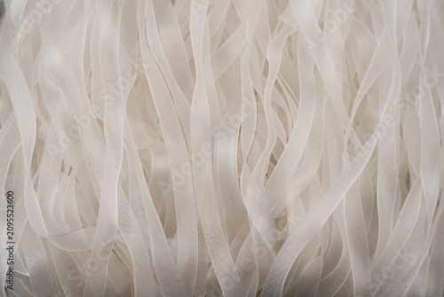 Green bean noodles background texture. Glass noodles pattern surface. Macro shot