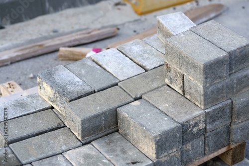 Stacked concrete pavers ready for construction project