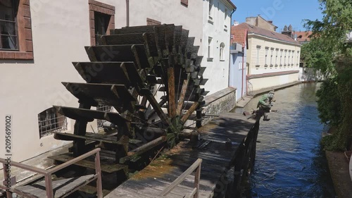 Water Mill in city of Prague in Czechia (Czech Republic). Waterwheel on Certovka Canal (the Devil's Channel) in Lesser Town (Mala Strana).