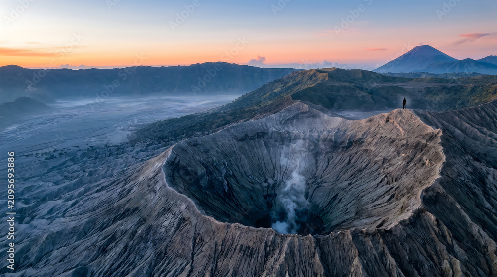 Fototapeta premium Aerial View of Mount Bromo Crater at Sunrise in East Java Indonesia