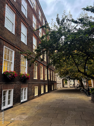 Photography Historic brick buildings in London Temple district with elegant white sash windo