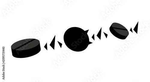 Black charcoal tablets dissolving and fragmenting into small pieces