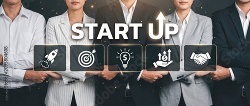 Energetic business team working together on innovative startup concepts featuring creative visuals that symbolize growth innovation and collaboration in a professional environment