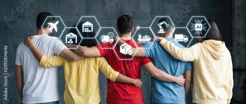 A diverse group of friends working together on logistics and technology ideas surrounded by digital icons that symbolize supply chain management and innovative solutions