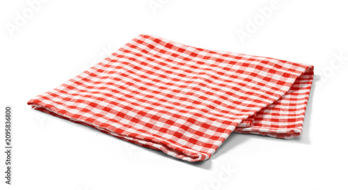 Red napkin on white background. Folded red-and-white gingham kitchen towel isolated.