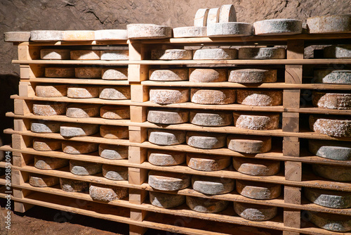 Italia, in the Julian Alps a Cheese aging cellar located in closed mines.