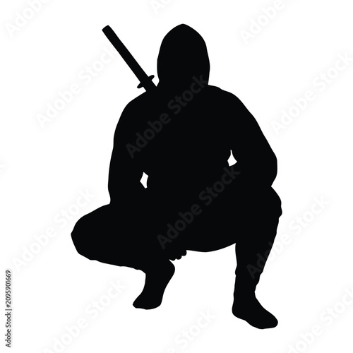 Fotografija Silhouette of a crouching figure with a sword on the back.