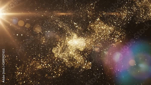 A mesmerizing abstract image showcases swirling golden particles against a dark, bokeh-filled background, creating a sense of ethereal beauty and dynamic movement.