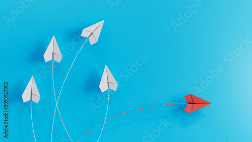 Single Red Paper Plane Takes A Divergent Separate Flight Path