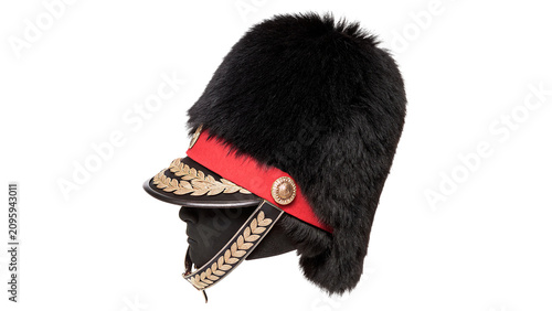 Tableau sur toile Traditional British royal guard tall black bearskin hat uniform accessory isolat