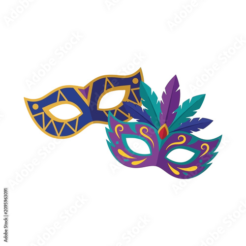 Two ornate masquerade masks decorated with feathers for carnival celebration