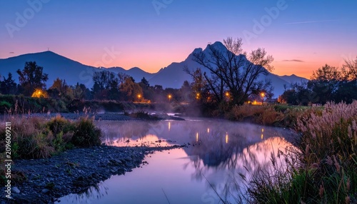 Serene Mountain Landscape at Twilight with Reflecting River.