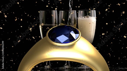 Pouring, gold ring rotating and tilting forward while right flute filling, showing gem reflections