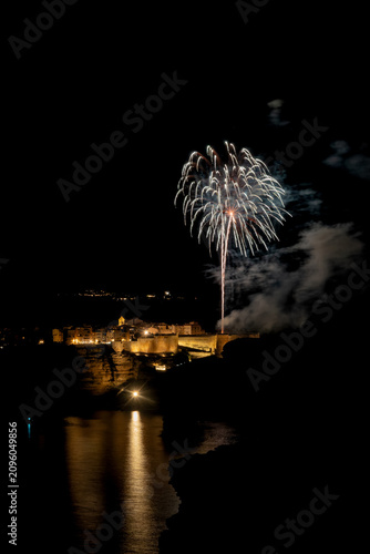 Fireworks exploding over Bonifacio town on Corsican coast