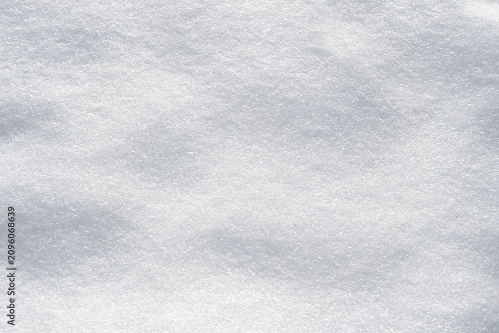 Fototapeta premium Winter snow abstract background, texture of fresh white snow top view,
